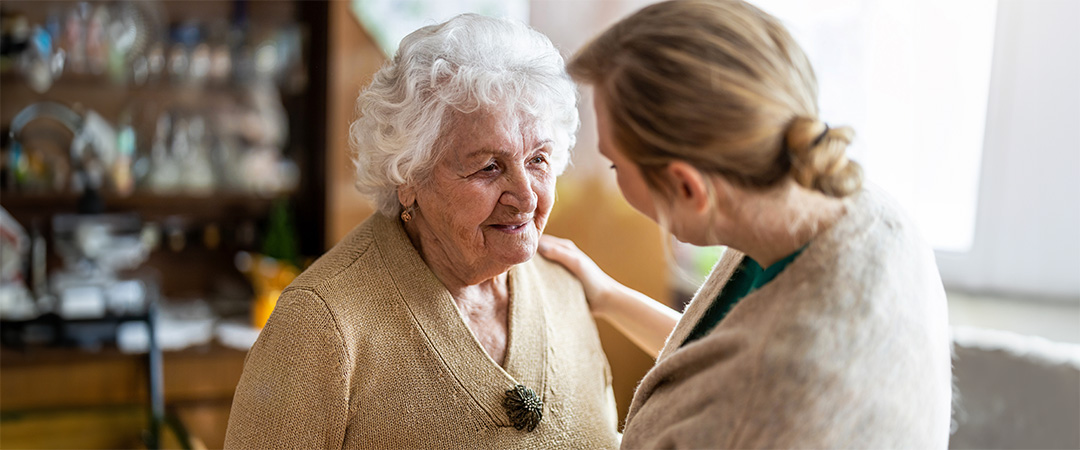 Resident listening to music in a library